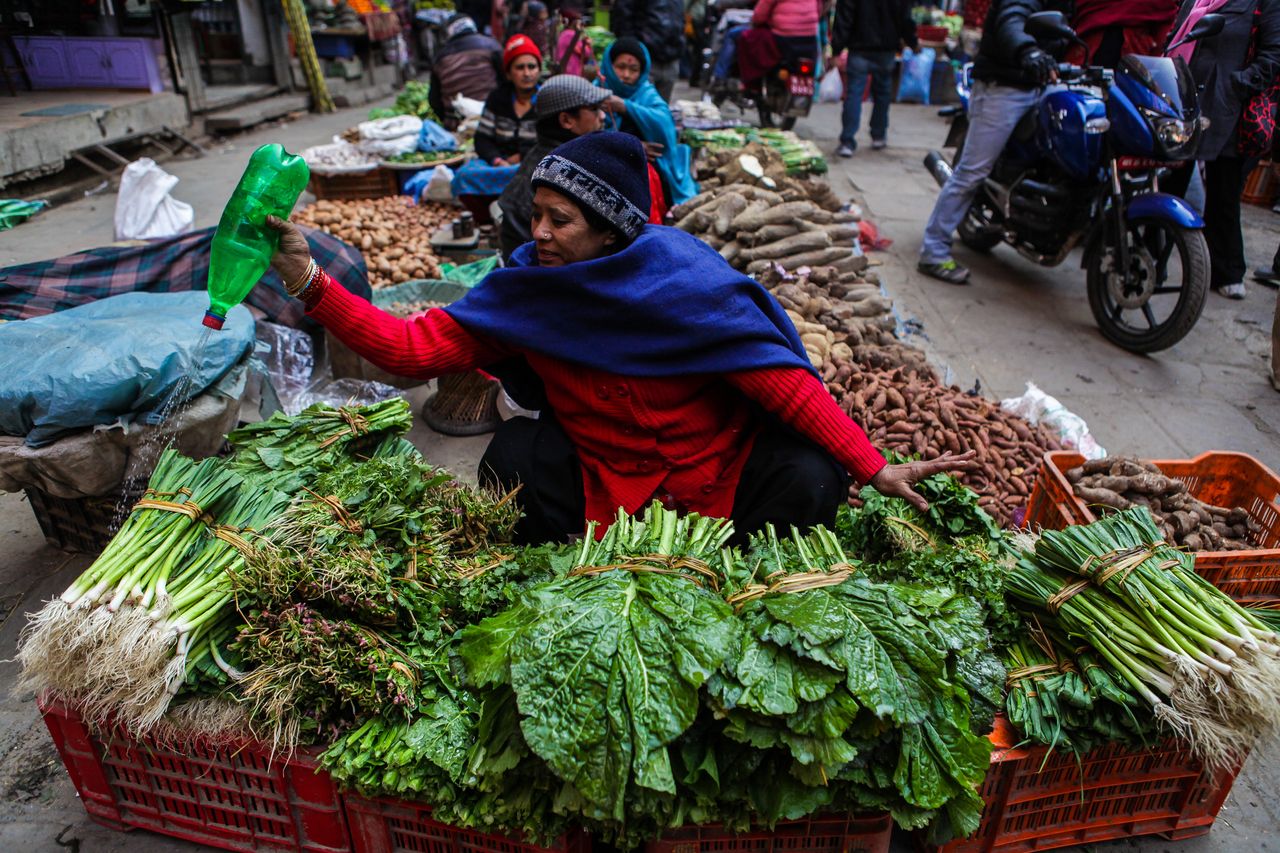 people on the street sell vegetable in Kathmandu