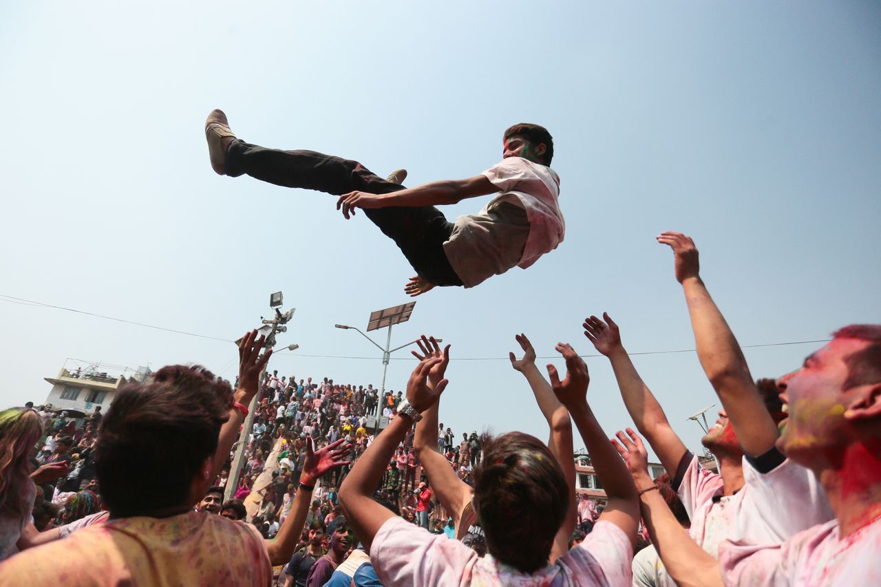 People celebrating Holi Festival of Colors, in Kathmandu